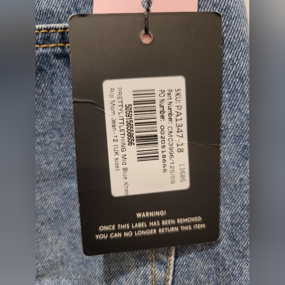 Brand new with tags Pretty Little Thing Mid Blue Knee Rip Mom Jeans Size 12 - Picture 5 of 5